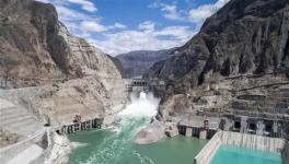 世界首座300米級低熱水泥混凝土特高拱壩全線貫通！