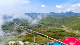 總長13.5公里！空中水泥熟料運輸長廊試運行！